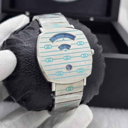 ساعة قوتشي طبلون للجنسين -  تصميم أنيق بلمسة فاخرة