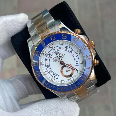 ساعة رولكس ياخت ماستر - فضي وذهبي بإطار أزرق ومينا أبيض