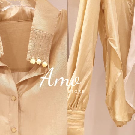 بلوزة انيقة ناعمة بأكمام طويلة الأبه بأزرار لؤلؤ جذابه