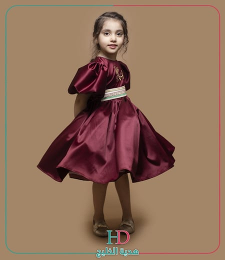 فستان عنابي_ كم كلوش