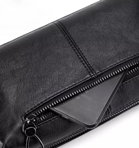 شنطة رجاليه جلد طبيعي لين عالية الجودة باللون الاسود  بفتحات للبطايق