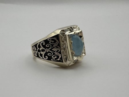 خاتم اكوامارين مرصع بـ ٨ الماسات