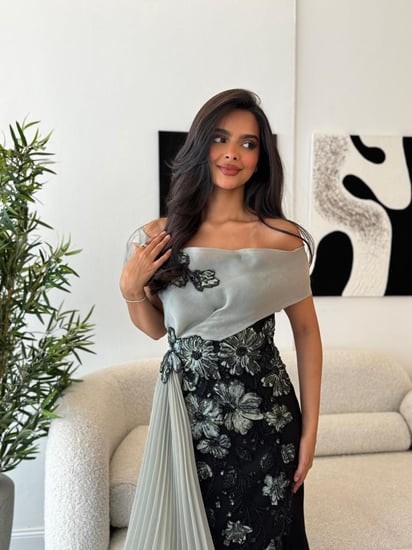 فستان سهرة أسود بتطريز فاخر وشال شيفون فاخر