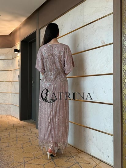 فستان سهرة أنيق بلون موف ناعم مائل للوردي