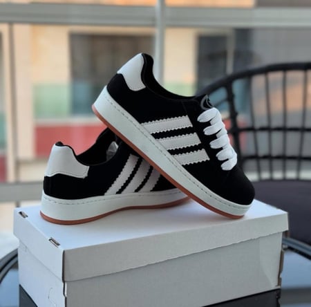 حذاء كانفاس لون اسود و ابيض ماستر كواليتي ماركة عالمية اصلي مريح فخم