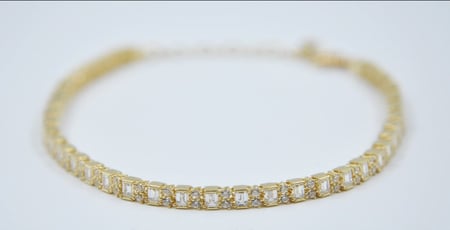 سحبة يد مزينة بالزركون فصوص باجيت عيار 18