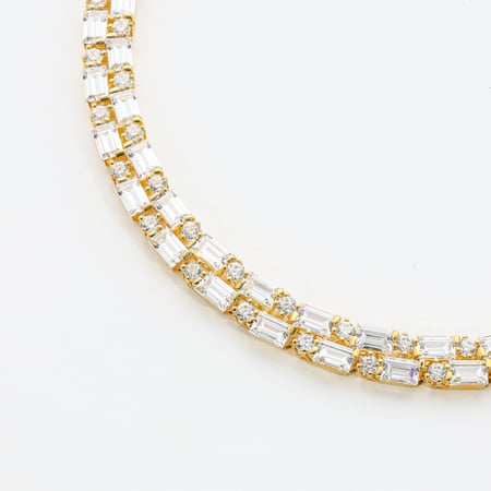 سحبة يد مزينة بالزركون وباجيت دورين غرام عيار 18