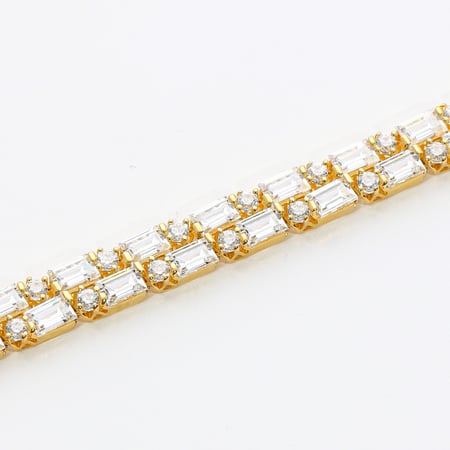 سحبة يد مزينة بالزركون وباجيت دورين غرام عيار 18