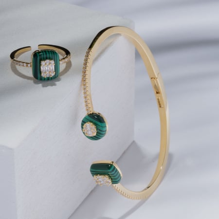 طقم اسواره وخاتم ملفت بلون ذهبي