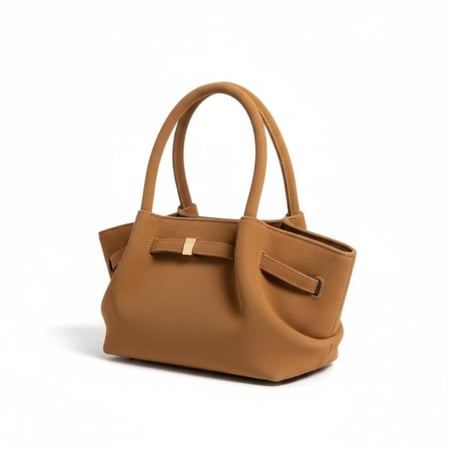Beige velvet bag with elegant details and a classic touch