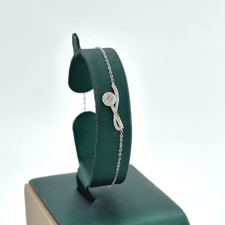 سوارة ذهب ابيض تصميم الماس عيار18 من مجوهرات الشلوي