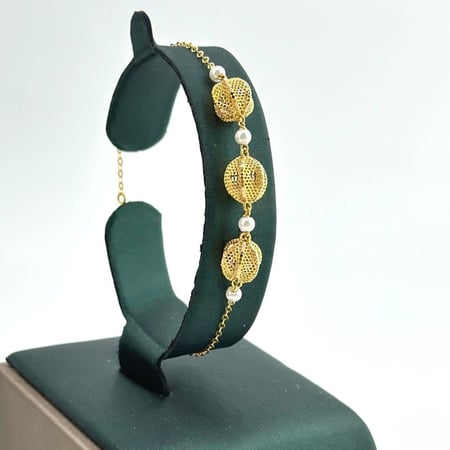 سوارة ذهب أصفر عيار 21 من مجوهرات الشلوي