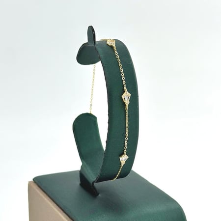 سوارة ذهب أصفر عيار 18 من مجوهرات الشلوي