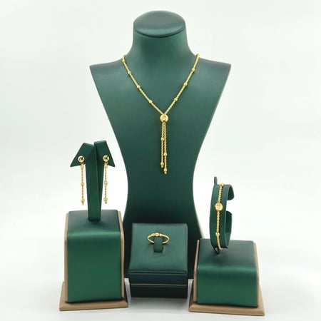 طقم ذهب اصفر عيار 21 من مجوهرات الشلوي