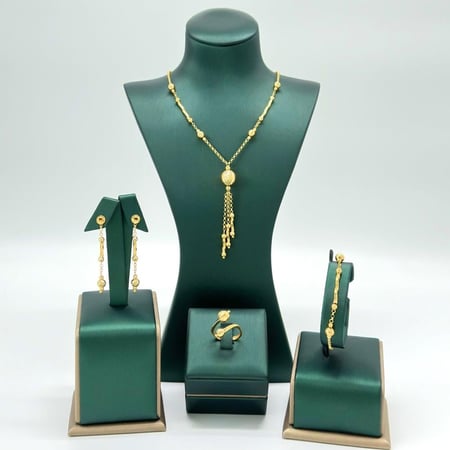 طقم ذهب اصفر عيار 21 من مجوهرات الشلوي