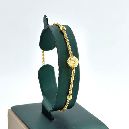 سوارة ذهب اصفر عيار 21 من مجوهرات الشلوي