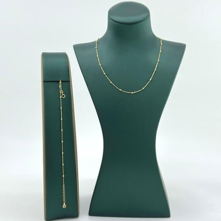 عقد و سوارة ذهب أصفر عيار 18 من مجوهرات الشلوي