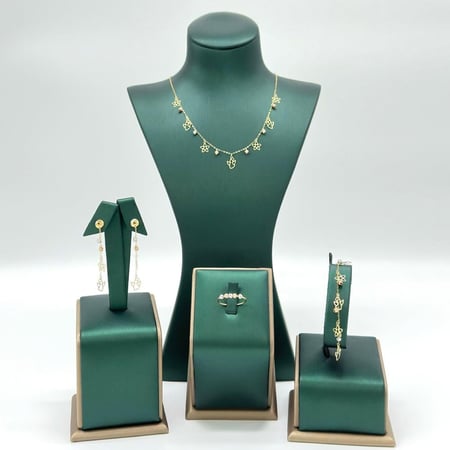 طقم ذهب اصفر عيار 18 من مجوهرات الشلوي