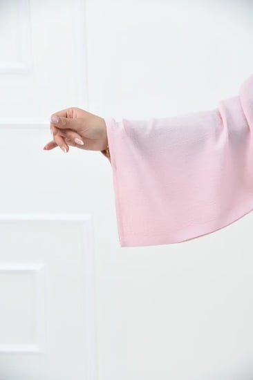 عباية وردي كاجوال بقماش فوكر