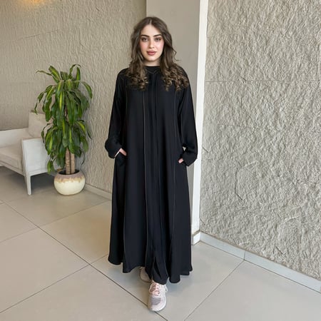 عباية نورة / رقمها 143