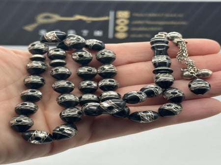 سبحة يسر حجازي مطعم بالفضه عدد الخرز 33