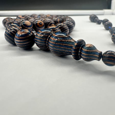 سبحة عيون  من خشب الكافور