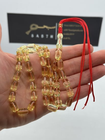 سبحة كهرمان بلطيقي حر مائي شفاف فرز سوبر  45 خرزه