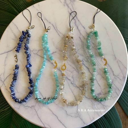 تعليقات جوال حجر مع حرف مطلي ذهب