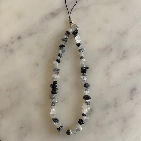 تعليقه جوال حجر اسود ممزوج بالابيض