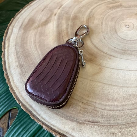 محفظة ريموت عنابي