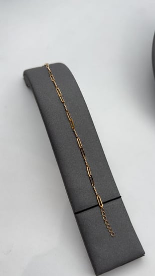 عقد مع سوارة ذهب عيار 18