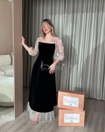 فستان ناعم اسود مميز باكمام بف