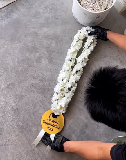 تعليقه تخرج بالاسم مع الورد