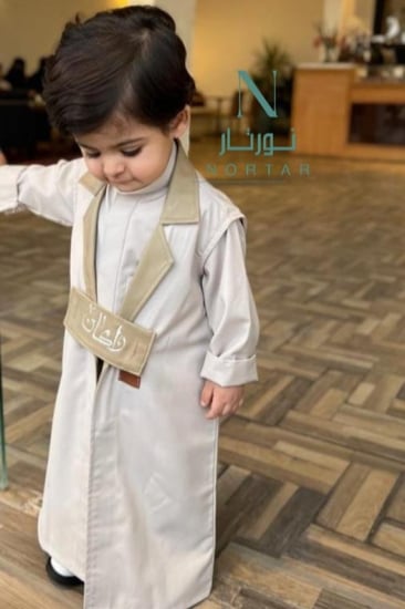 دقلة اطفال مطرزه بالأسم