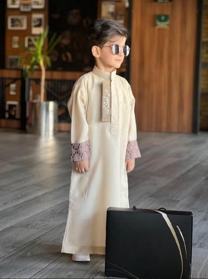 دقلة اطفال مطرزه بالأسم