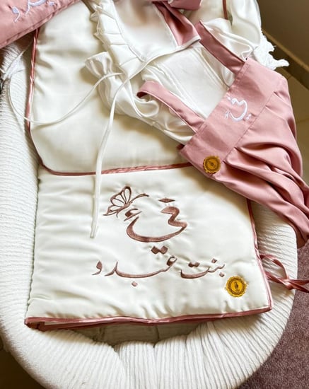 ملابس استقبال مولود