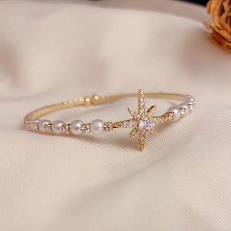 اسوارة مطلية من الزركون واللؤلؤ