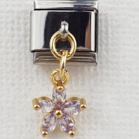 تشارمز فضي مع تعليقة وردة كرستال مذهبه