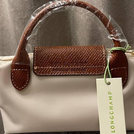 Longchamp XS - بيج مع ستراب
