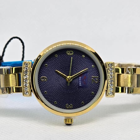 ساعة نسائية ميناء دائري كحلي و سوار ذهبي مفصص