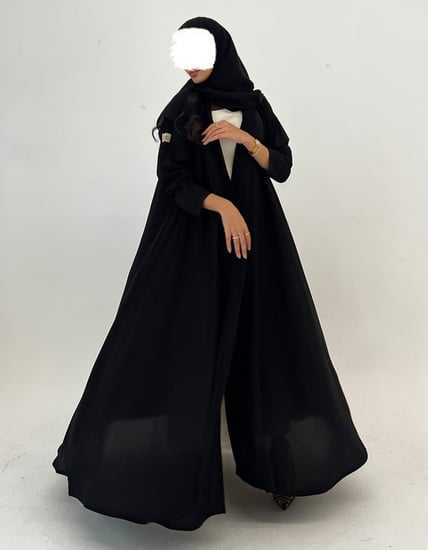 عباية عملية كريب أسود كلوش ساده