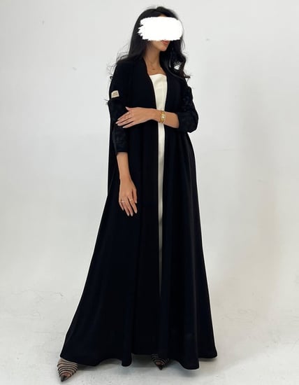 كريب كلوش أسود تطريز يدوي أكمام اغصان