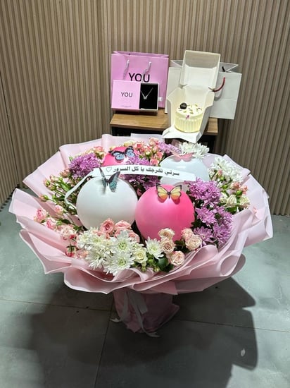 هدايا تخرج بوكيه مع سلسال فضه وكيك