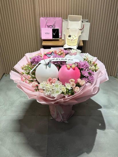 هدايا تخرج بوكيه مع سلسال فضه وكيك