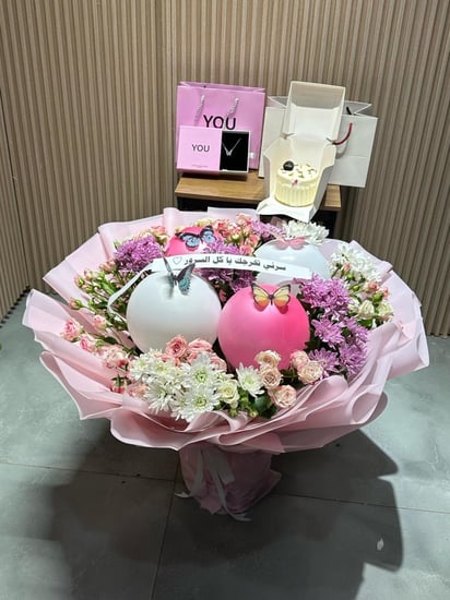 هدايا تخرج بوكيه مع سلسال فضه وكيك