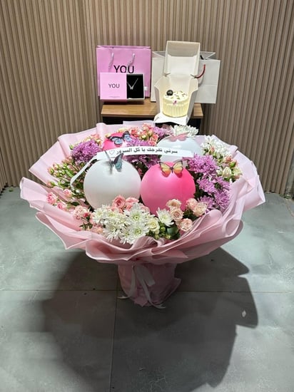 هدايا تخرج بوكيه مع سلسال فضه وكيك