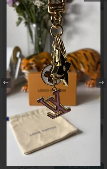 ميدالية لويس فيتون شامل كيس قماشي و بوكس