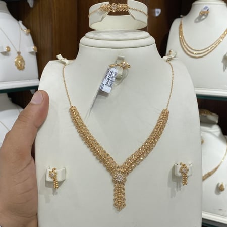 طقم ذهب عيار 21 وزن 22.02