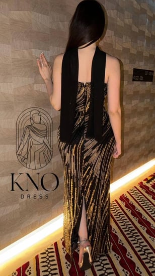 فستان بايري أسود ذهبي بتصميم كورسيه وتطريز شك يدوي وشال جورجيت