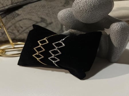 اسواره فضي وذهبي سحب